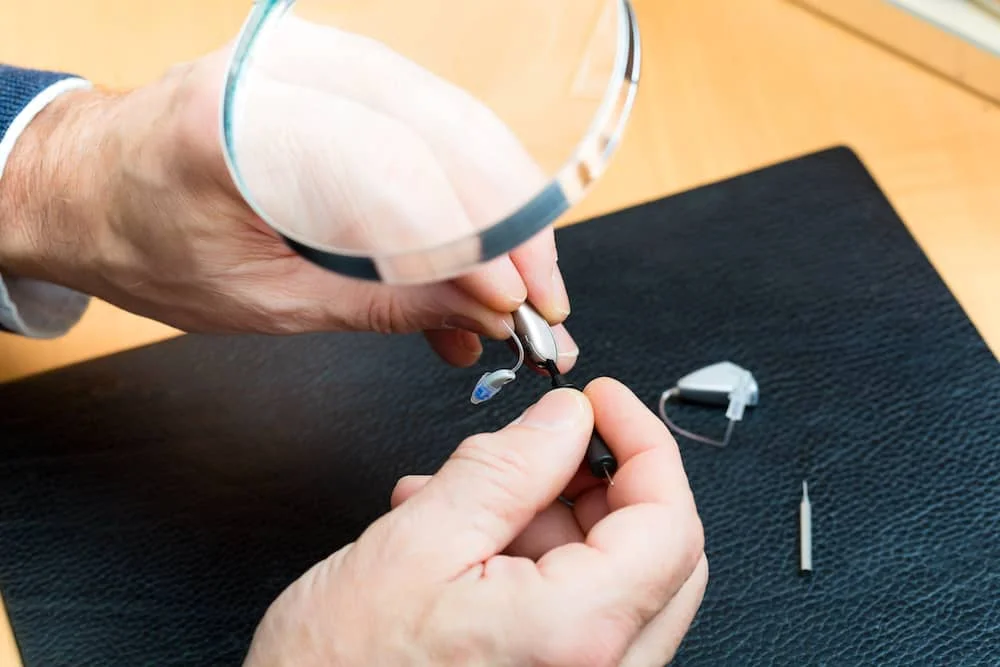change hearing aid batteries